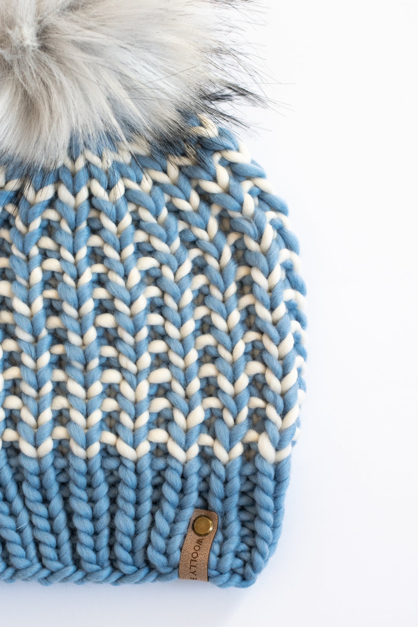 Blue and Ivory Striped Merino Wool Knit Hat with Faux Fur Pom Pom