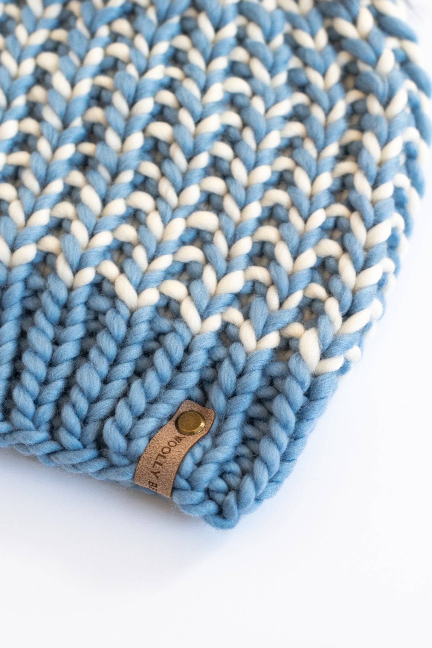 Blue and Ivory Striped Merino Wool Knit Hat with Faux Fur Pom Pom