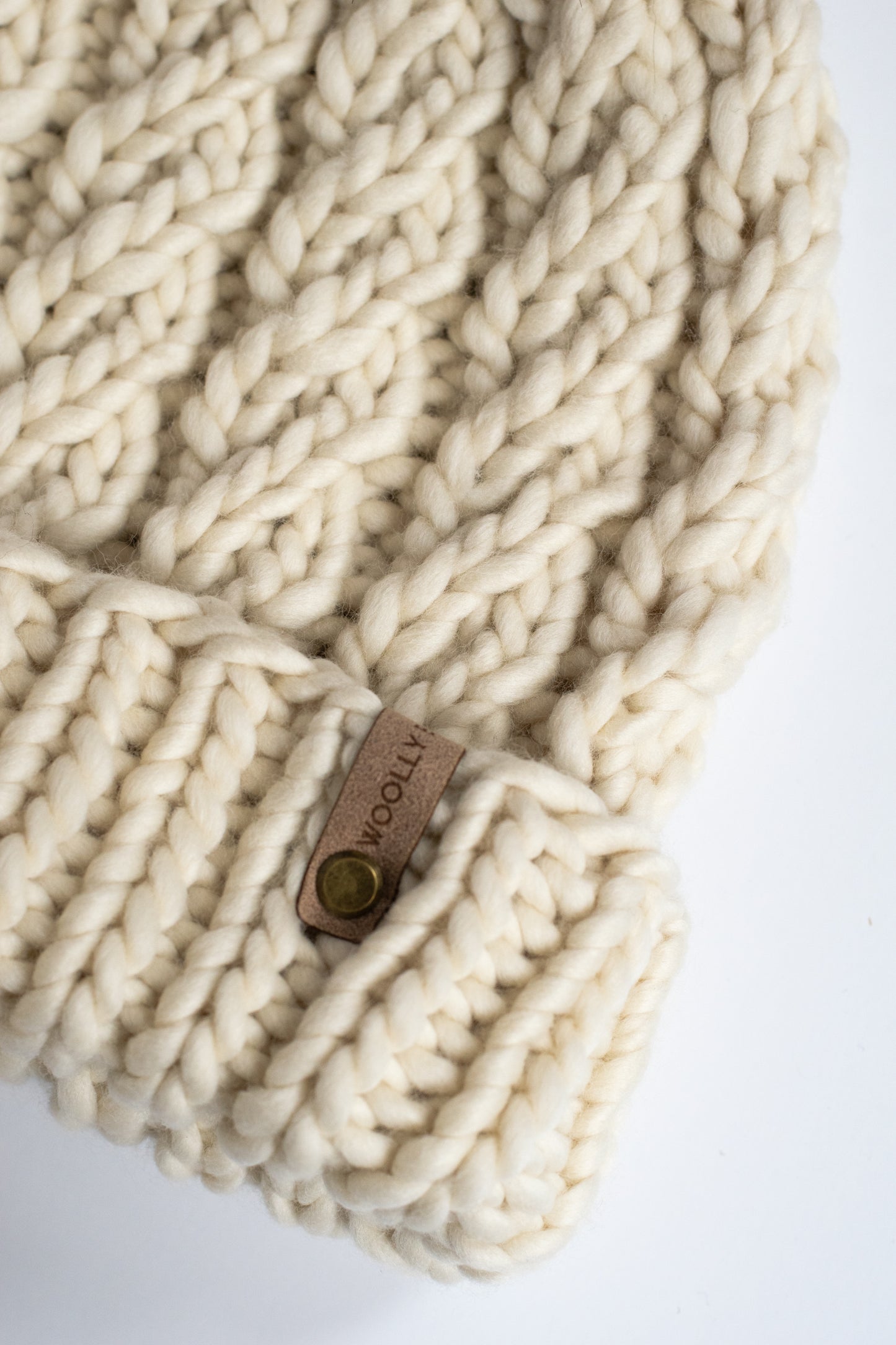 Ivory Merino Wool Knit Hat with Faux Fur Pom Pom