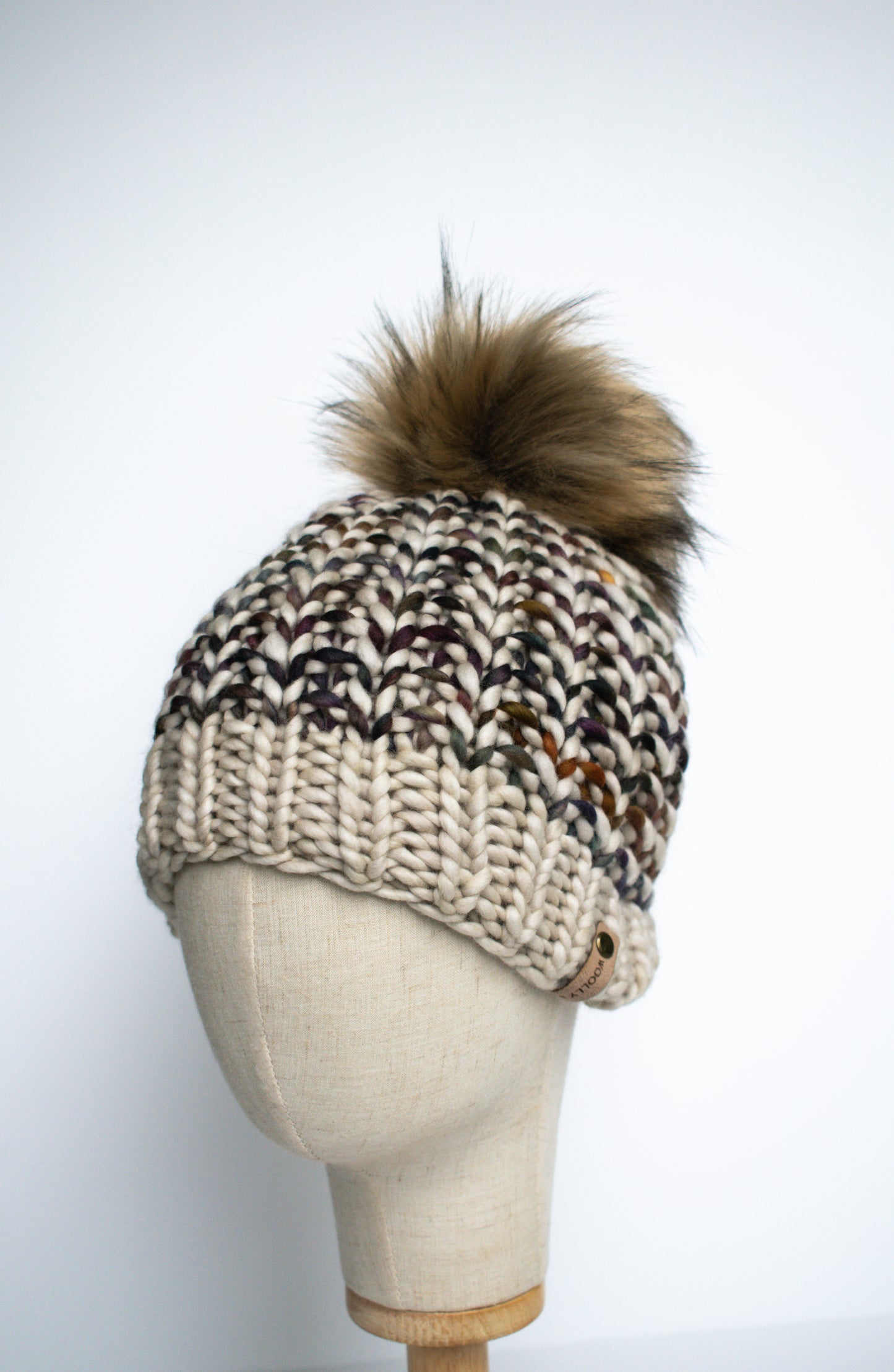 Beige and Brown Striped Merino Wool Knit Hat with Faux Fur Pom Pom