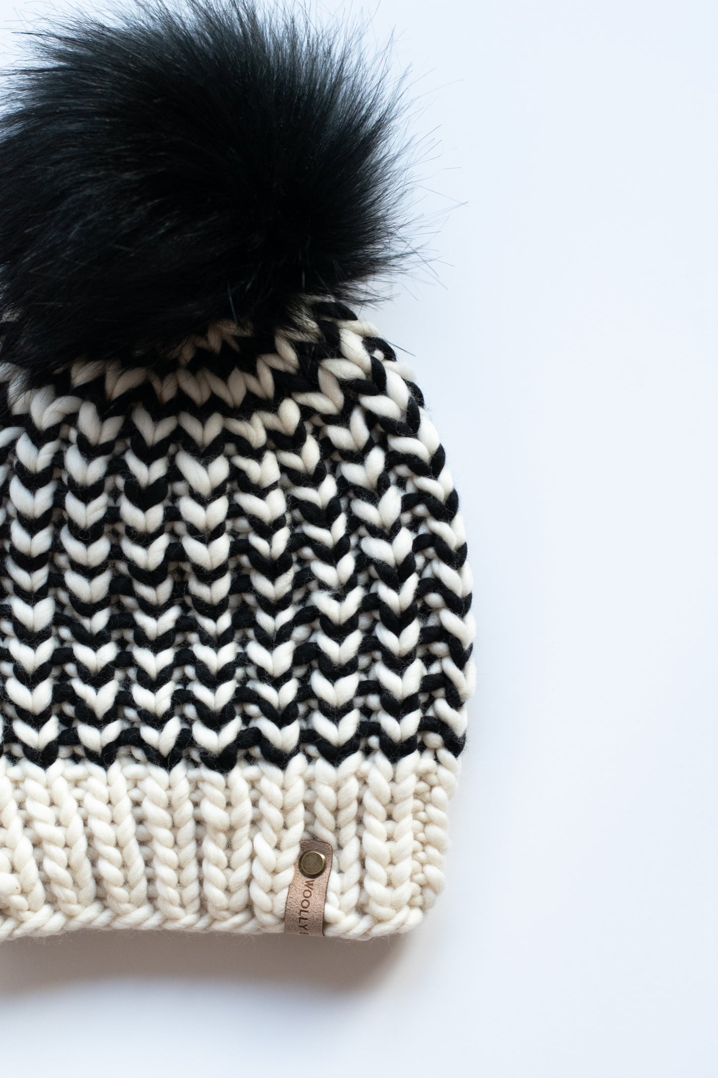 Black and White Striped Merino Wool Knit Hat with Faux Fur Pom Pom