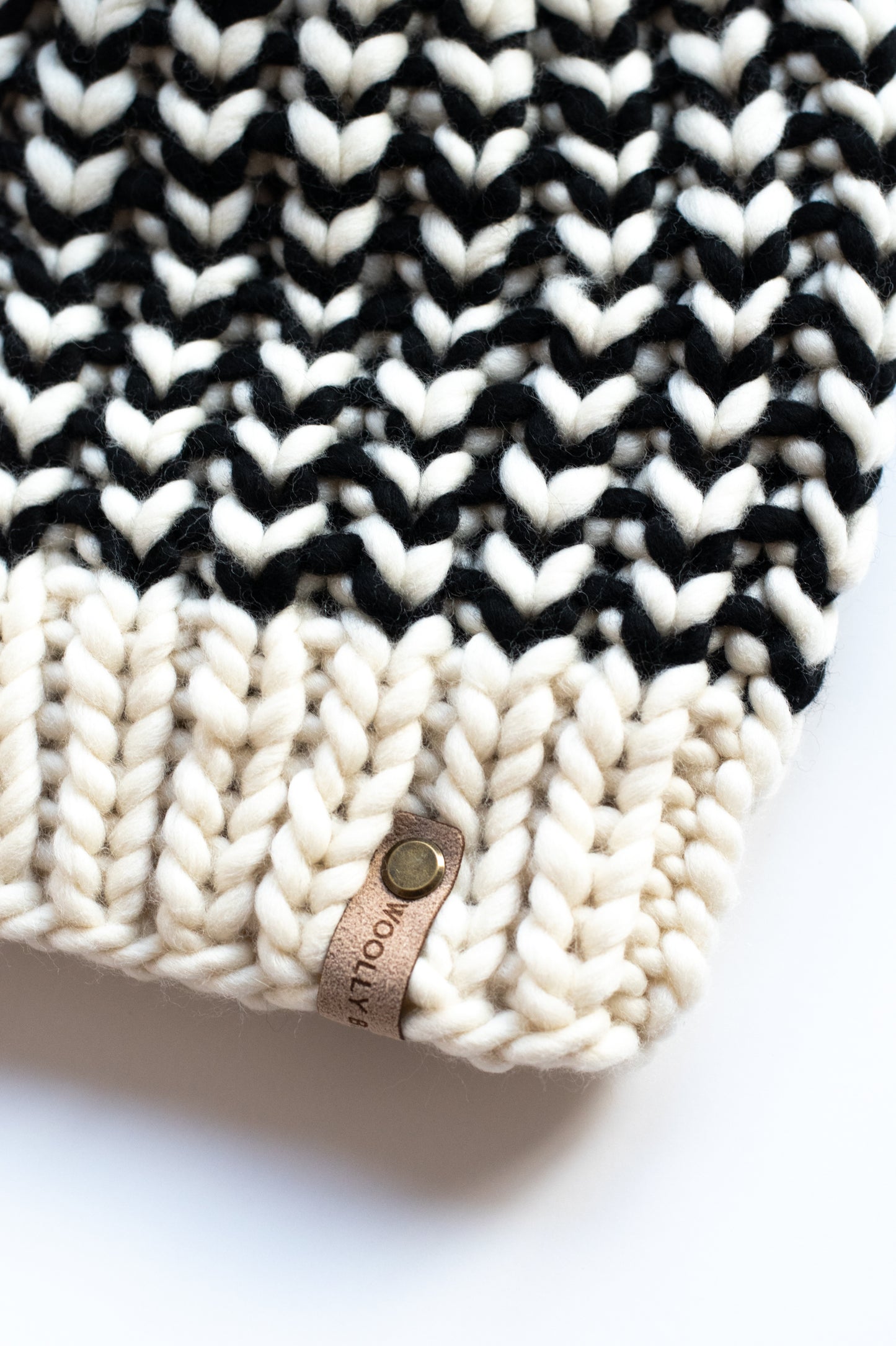 Black and White Striped Merino Wool Knit Hat with Faux Fur Pom Pom