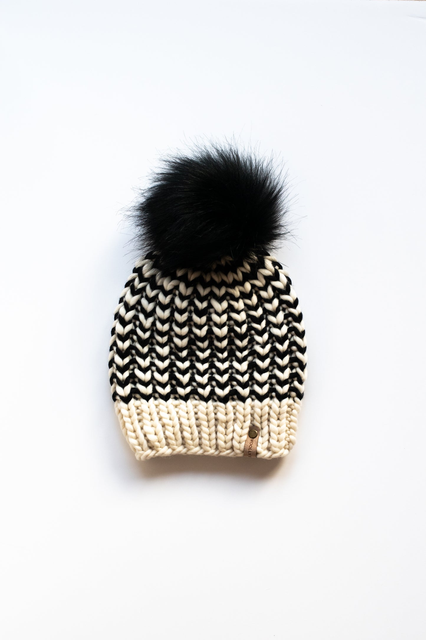 Black and White Striped Merino Wool Knit Hat with Faux Fur Pom Pom