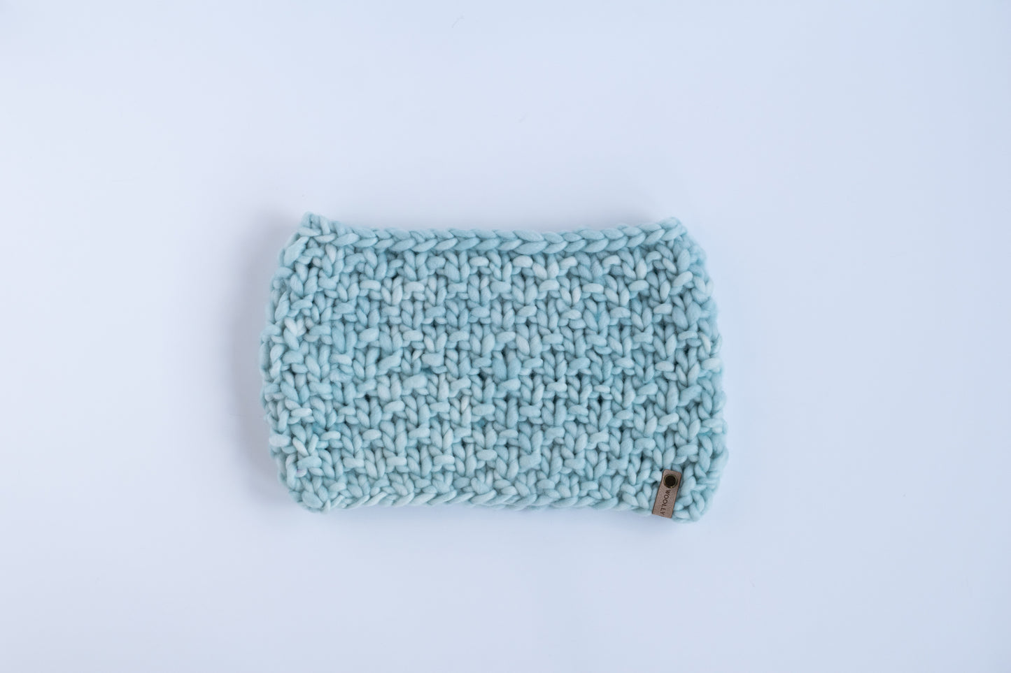 Light blue textured scarf on a white background