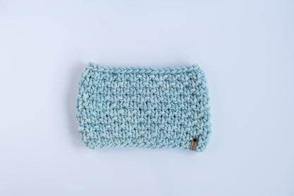 Light blue textured scarf on a white background